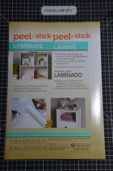 Duck Brand White Laminate label - I get it at Lowes for $1.97 a roll.